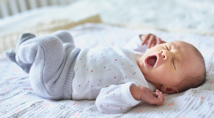 A newborn yawning.