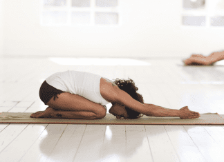 A woman stretching doing yoga.