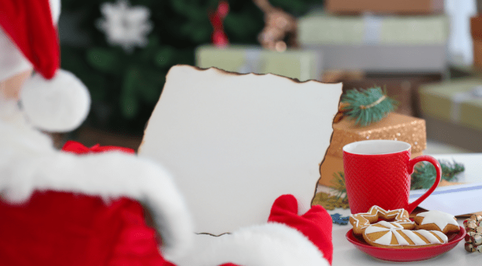 Santa making a naughty or nice list.