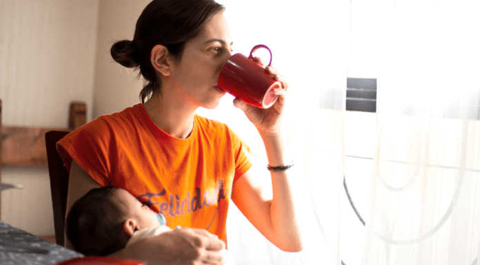 A mom drinking coffee.