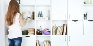 A woman organizing shelves.