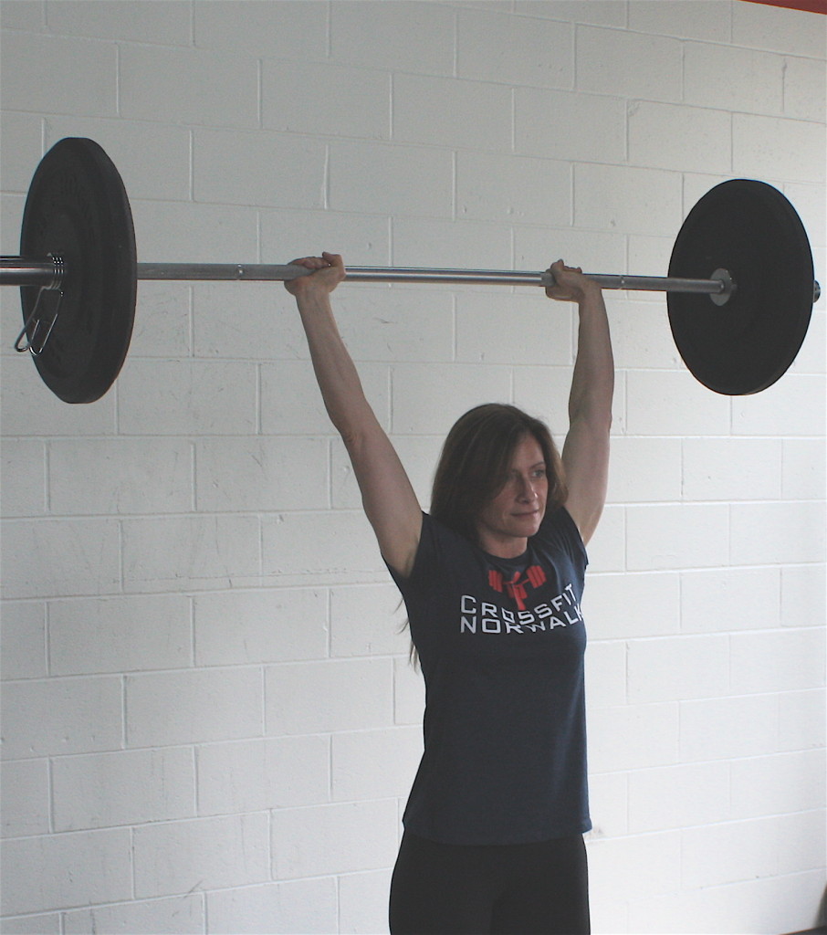 Susan in an overhead press position