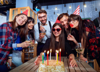 Adults celebrating a birthday.