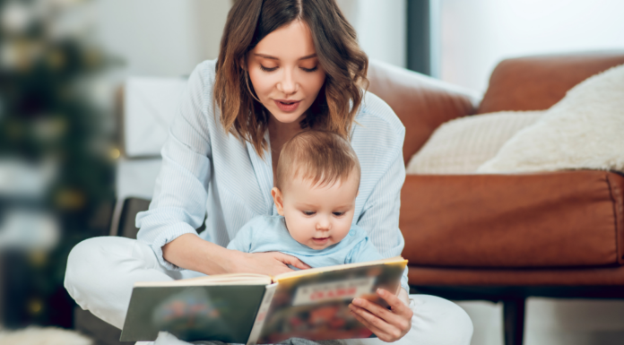 A mother reading to her baby.