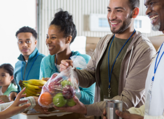 People donating time at a local food drive.