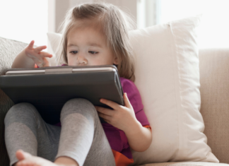 In Defense of Technology A toddler on an iPad.