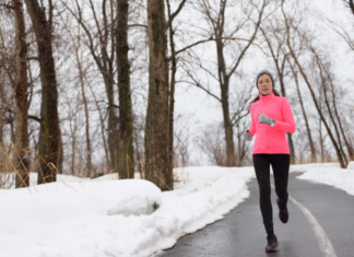 A woman running outside in the winter.