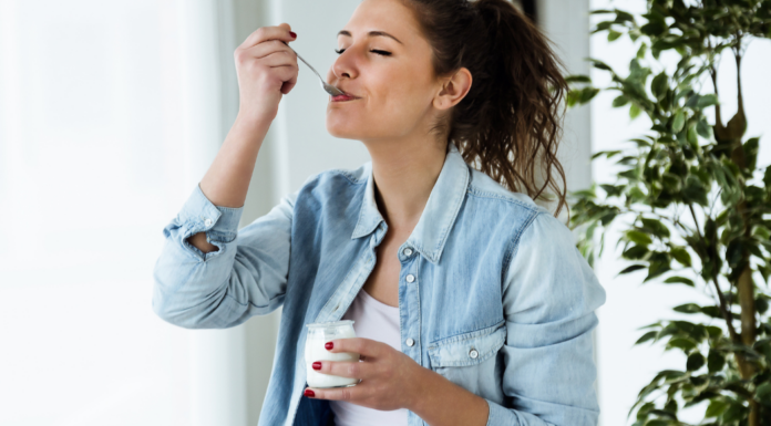 A woman enjoying her food.