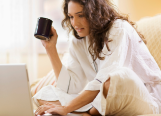 Reader Survey: We Want to Hear From You! {+giveaway} A woman taking a reader survey on the computer.