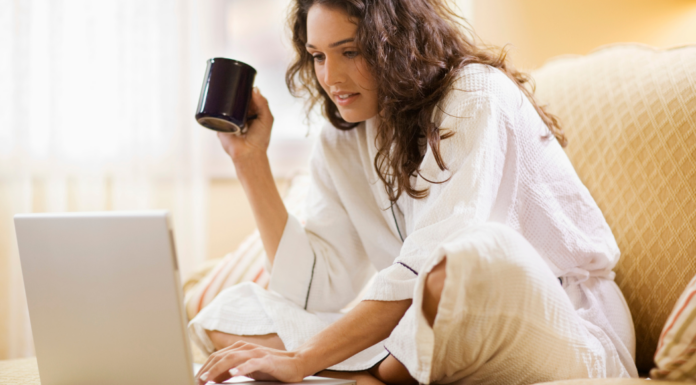 Reader Survey: We Want to Hear From You! {+giveaway} A woman taking a reader survey on the computer.