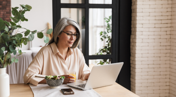 Woman doing an year end review on the computer.