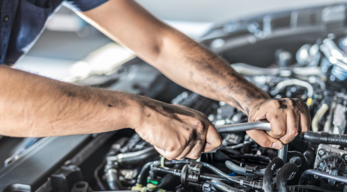 The Mobile Mechanic working on a car.