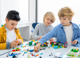 Let’s Love on Legos Boys playing with Legos.