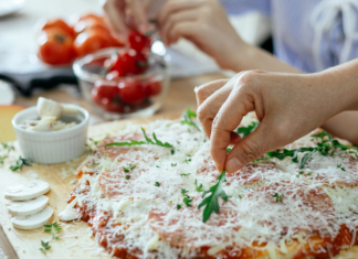 Making a pizza.