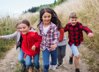 Rain, Rain Go Away: Where We’re Going This Spring Kids running in a field.