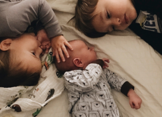 Siblings with a new baby.
