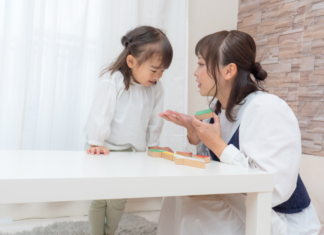 Say What? What Parenting Has Made Us Say A woman talking to her child.
