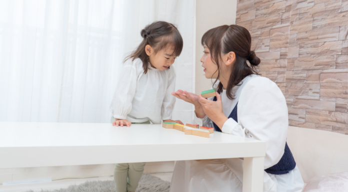 A woman talking to her child.
