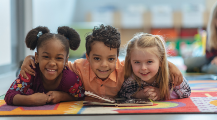 Children reading foreign language books.