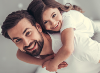 A dad with his daughter.