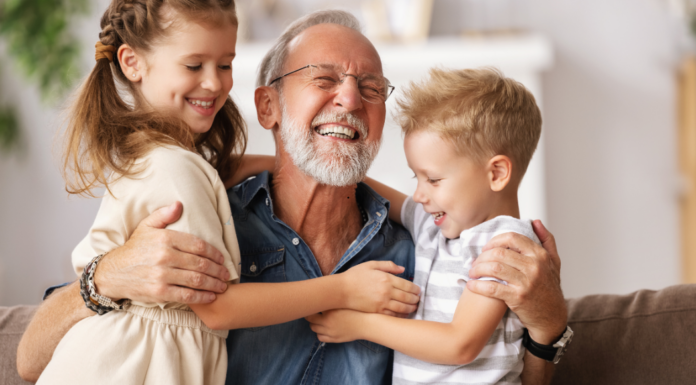 A grandfather with his grandchildren.
