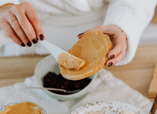 Making a peanut sandwich.