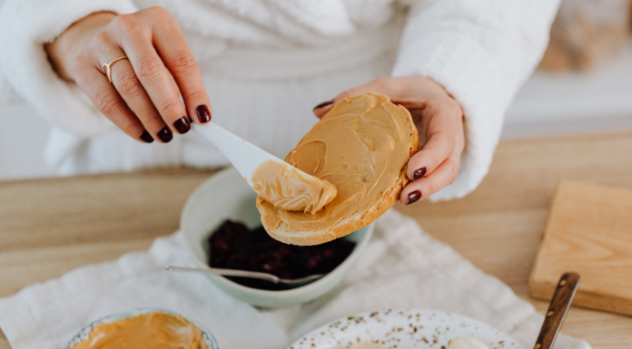 Making a peanut sandwich.