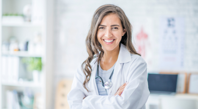 A doctor with her arms crossed.