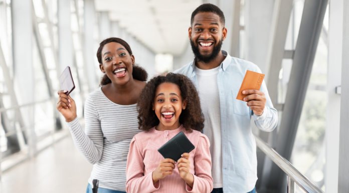 A family holding their passports.