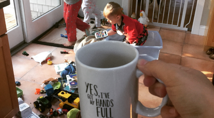A mug that says, Yes my hands are full.