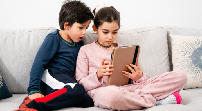 Kids watching YouTube on the tablet.