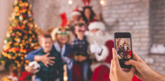 Family taking a photo with Santa.