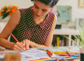 A woman coloring to calm down.