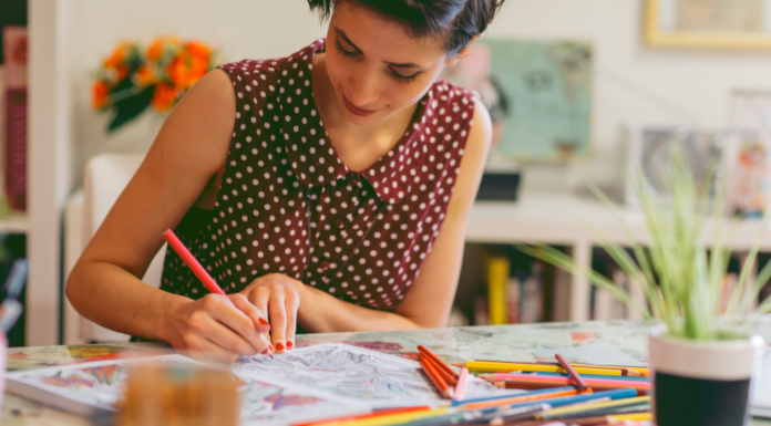 A woman coloring to calm down.
