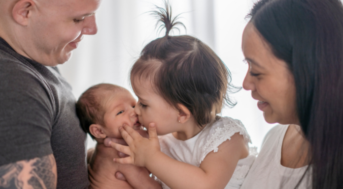 A family welcoming their second baby.