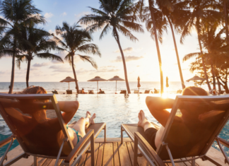 A couple lounging at a travel resort.