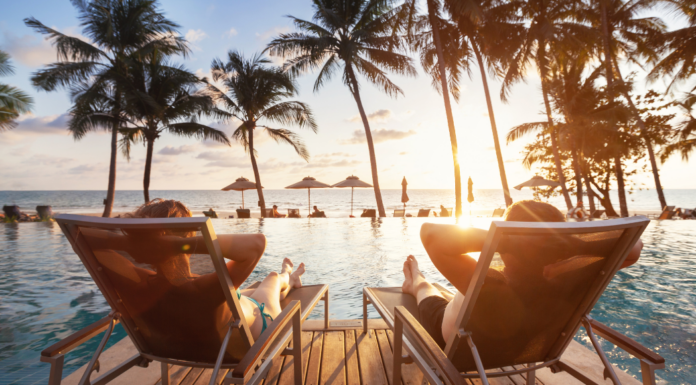 A couple lounging at a travel resort.