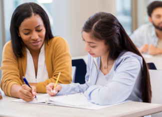 A college consular working with a girl.