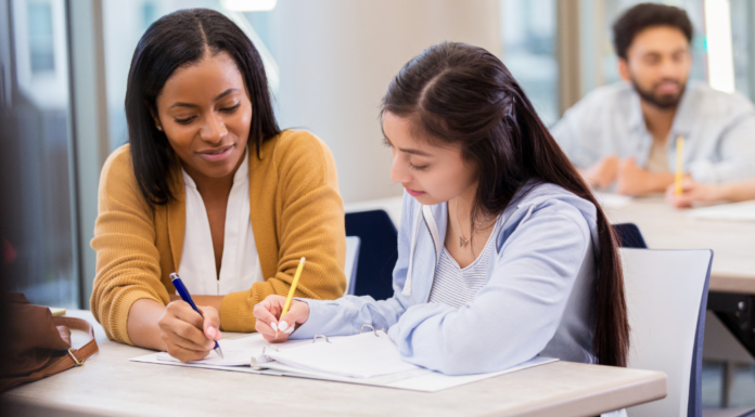 A college consular working with a girl.