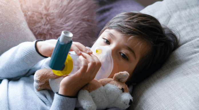 A child with a nebulizer.
