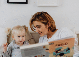 A Mom reading to her child.