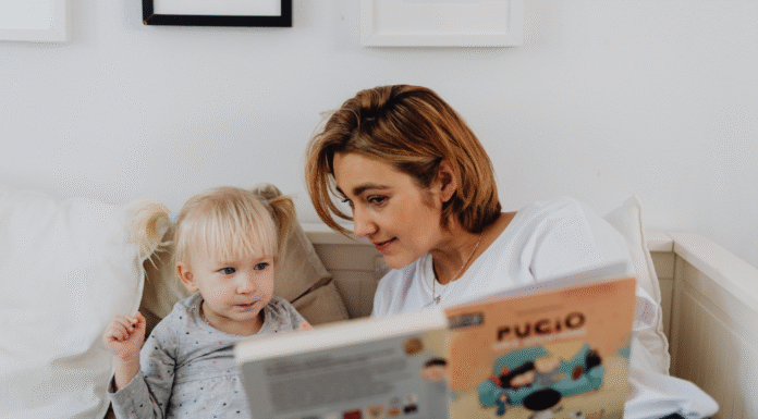A Mom reading to her child.