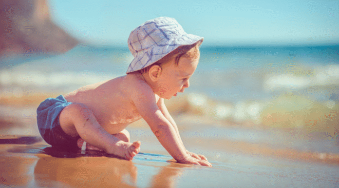 A baby at the beach.