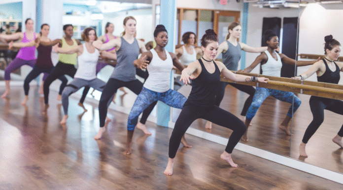 Women at a barre class.