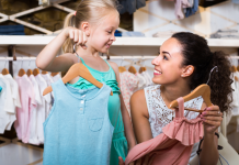 A mom and daughter shopping for school clothes.