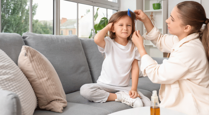 A mom checking for lice.