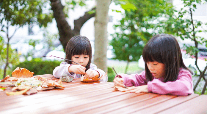 Girls doing a nature craft