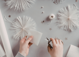 Cutting paper for a craft.