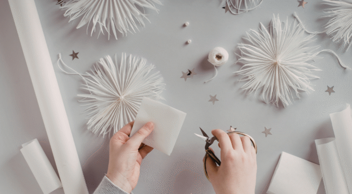 Cutting paper for a craft.