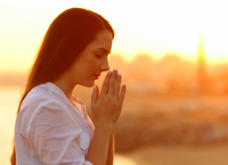 A woman praying.